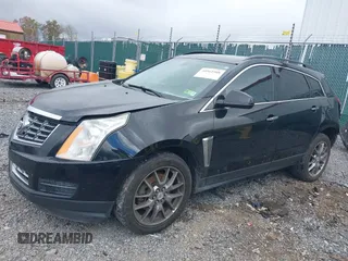 2015 Cadillac SRX z VIN 3GYFNAE30FS515953, wystawiony jako IAAI lot #40562508 z przebiegiem 163 112 mil mil oraz . Historia ofert i sprzedaży dostępna na DreamBid. Obrazek 2.