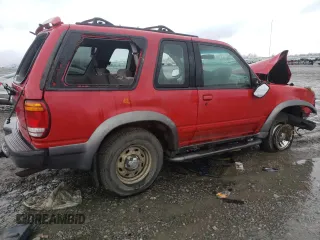 1999 Ford Explorer z VIN 1FMYU22E4XUC00826, wystawiony jako Copart lot #37296674 z przebiegiem 228 735 mil mil oraz Szkoda całkowita • Salvage title. Historia ofert i sprzedaży dostępna na DreamBid. Obrazek 3.