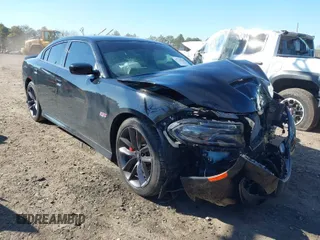 2019 Dodge Charger Scat Pack with VIN 2C3CDXGJ3KH740055, listed as a IAAI auction lot 41736718 with 68,934 mi miles and . Bid and sale history available at DreamBid. Image 1.