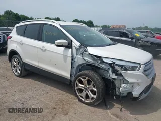 2019 Ford Escape Titanium with VIN 1FMCU9J90KUA86338, listed as a IAAI auction lot 42690159 with 115,891 mi miles and . Bid and sale history available at DreamBid. Image 1.