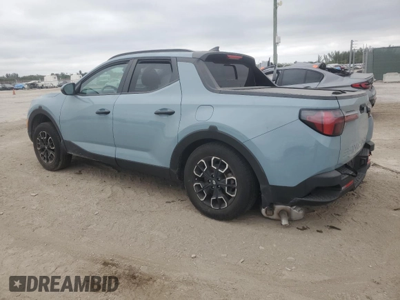 2023 Hyundai Santa Cruz SEL z VIN 5NTJC4AE4PH043025, wystawiony jako Copart lot #41617645 z przebiegiem Nie podano mil oraz Nie do naprawy • Non repairable. Historia ofert i sprzedaży dostępna na DreamBid. Obrazek 2.