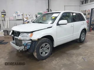 2012 Suzuki Grand Vitara Premium z VIN JS3TD0D26C4100406, wystawiony jako IAAI lot #42039965 z przebiegiem 106 671 mil mil oraz . Historia ofert i sprzedaży dostępna na DreamBid. Obrazek 2.