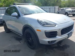 2016 Porsche Cayenne S z VIN WP1AB2A26GLA93091, wystawiony jako IAAI lot #42223392 z przebiegiem 64 795 mil mil oraz . Historia ofert i sprzedaży dostępna na DreamBid. Obrazek 1.