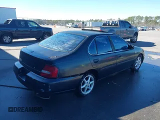 2001 Nissan Altima GXE with VIN 1N4DL01A11C157221, listed as a IAAI auction lot 41702378 with 206,648 mi miles. Bid and sale history available at carsss.com. Image 4.