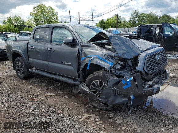 2023 Toyota Tacoma SR with VIN 3TMCZ5AN7PM586455, listed as a Copart auction lot 58191165 with Not provided miles and Salvage title. Bid and sale history available at DreamBid. Image 4.