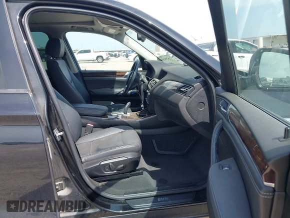 2015 BMW X3 sDrive28i with VIN 5UXWZ7C51F0M82937, listed as a IAAI auction lot 42028655 with 122,969 mi miles and . Bid and sale history available at DreamBid. Image 5.