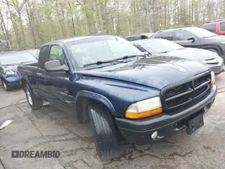 2002 Dodge Dakota Sport with VIN 1B7GL32X12S561414, listed as a IAAI auction lot 42060300 with 235,957 mi miles. Bid and sale history available at carsss.com. Image 1.