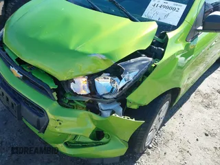 2016 Chevrolet Spark LS with VIN KL8CB6SAXGC580309, listed as a IAAI auction lot 41490002 with 51,631 mi miles. Bid and sale history available at carsss.com. Image 19.