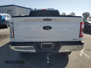 2023 Ford F-150 XL with VIN 1FTFW1E82PFB33122, listed as a Copart auction lot 58625905 with 21,184 mi miles and Salvage title. Bid and sale history available at DreamBid. Image 6.
