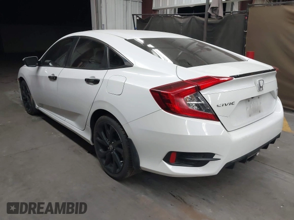 2019 Honda Civic Sport with VIN 19XFC2F86KE022749, listed as a IAAI auction lot 42127993 with 116,279 mi miles and . Bid and sale history available at DreamBid. Image 3.