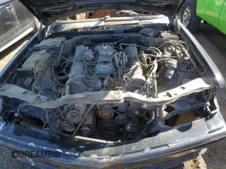 1984 Mercedes-Benz 500 z VIN WDBCA44A5EA079878, wystawiony jako Copart lot #49240915 z przebiegiem Nie podano mil oraz Nie do naprawy • Non repairable. Historia ofert i sprzedaży dostępna na DreamBid. Obrazek 11.