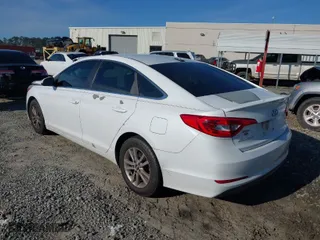 2017 Hyundai Sonata 2.4L with VIN 5NPE24AF9HH585587, listed as a IAAI auction lot 41609567 with 157,029 mi miles. Bid and sale history available at carsss.com. Image 3.