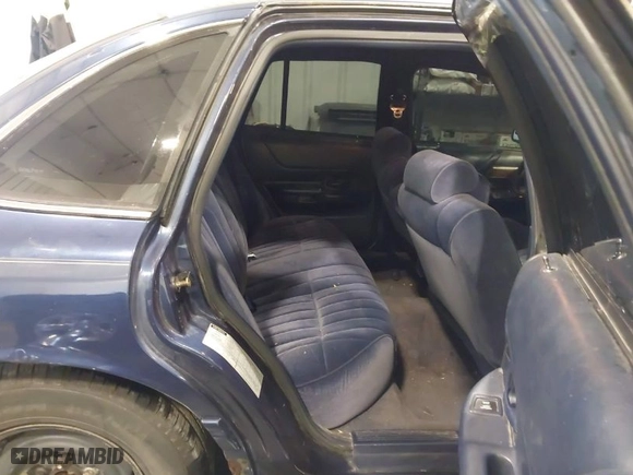 1994 Ford Crown Victoria with VIN 2FALP73W7RX115913, listed as a IAAI auction lot 41899751 with 159,361 mi miles. Bid and sale history available at carsss.com. Image 8.