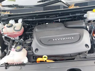 2021 Chrysler Pacifica Hybrid Touring L z VIN 2C4RC1L7XMR593987, wystawiony jako IAAI lot #41855966 z przebiegiem 72 685 mil mil oraz . Historia ofert i sprzedaży dostępna na DreamBid. Obrazek 10.