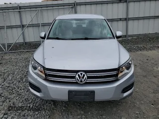 2014 Volkswagen Tiguan S z VIN WVGBV3AX7EW545782, wystawiony jako Copart lot #58711824 z przebiegiem 62 616 mil mil oraz Szkoda całkowita • Salvage title. Historia ofert i sprzedaży dostępna na DreamBid. Obrazek 5.