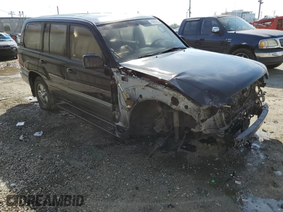 2001 Lexus LX 470 with VIN JTJHT00W613504449, listed as a Copart auction lot 45995455 with 229,056 mi miles and Salvage Title. Bid and sale history available at DreamBid. Image 4.