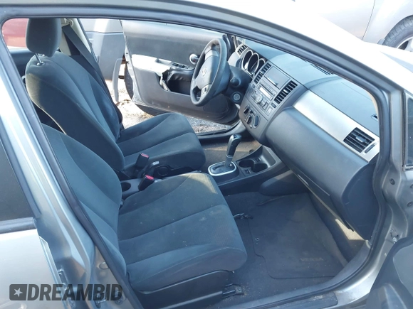 2011 Nissan Versa 1.8 S with VIN 3N1BC1AP9BL423170, listed as a IAAI auction lot 41821121 with 246,940 mi miles. Bid and sale history available at carsss.com. Image 5.