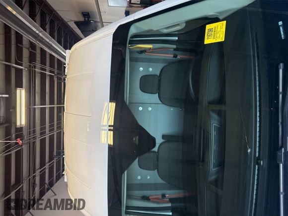 2023 Ford Transit Cargo with VIN 1FTBR1X86PKC09421, listed as a IAAI auction lot 42843981 with 10,233 mi miles and . Bid and sale history available at DreamBid. Image 15.