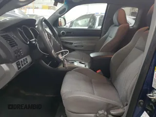 2014 Toyota Tacoma with VIN 5TFUU4EN3EX094570, listed as a Copart auction lot 49399185 with 85,472 mi miles and Salvage Title. Bid and sale history available at DreamBid. Image 7.
