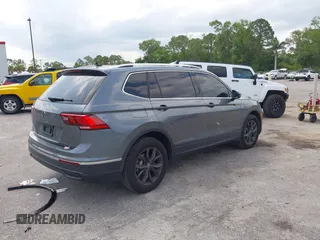 2024 Volkswagen Tiguan SE with VIN 3VVNB7AX4RM138429, listed as a IAAI auction lot 42303215 with Not provided miles and . Bid and sale history available at DreamBid. Image 4.