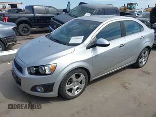 2012 Chevrolet Sonic LTZ z VIN 1G1JE5SB8C4210627, wystawiony jako IAAI lot #41662225 z przebiegiem 72 358 mil mil oraz . Historia ofert i sprzedaży dostępna na DreamBid. Obrazek 18.
