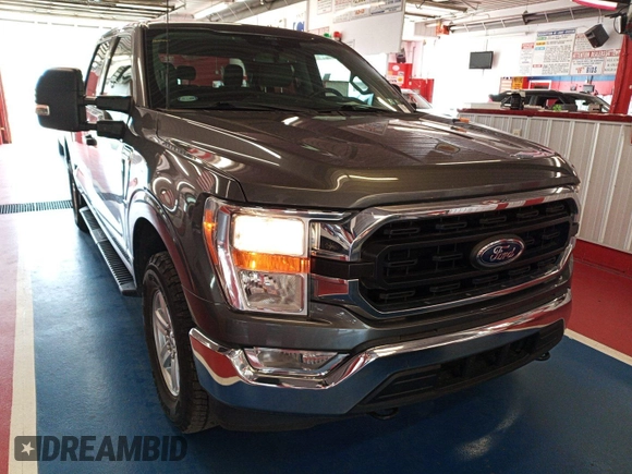 2021 Ford F-150 XL with VIN 1FTFW1E81MKE96112, listed as a IAAI auction lot 42788387 with 101,494 mi miles and . Bid and sale history available at DreamBid. Image 2.