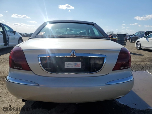 1999 Lincoln Continental with VIN 1LNHM97V1XY610090, listed as a Copart auction lot 50447685 with 105,375 mi miles and Clean Title. Bid and sale history available at carsss.com. Image 6.