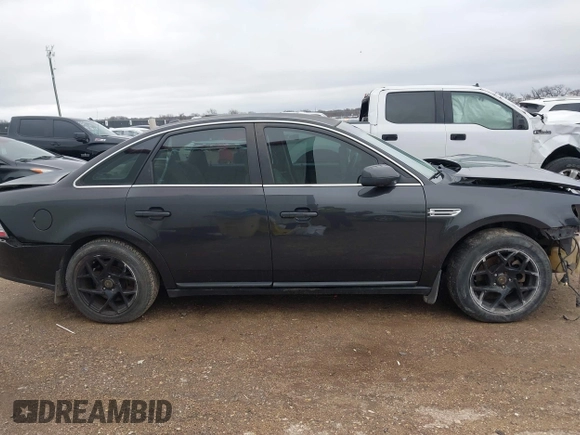 2008 Ford Taurus SEL with VIN 1FAHP24W28G108122, listed as a IAAI auction lot 41546652 with 219,774 mi miles. Bid and sale history available at carsss.com. Image 13.