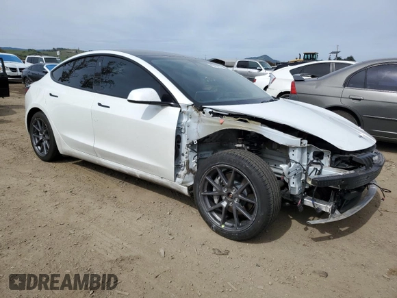 2022 Tesla Model 3 Long Range with VIN 5YJ3E1EB0NF123224, listed as a Copart auction lot 49890205 with 68,594 mi miles and Salvage Title. Bid and sale history available at DreamBid. Image 4.