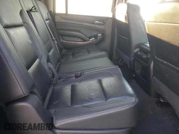 2020 Chevrolet Suburban Premier with VIN 1GNSCJKC9LR198484, listed as a Copart auction lot 87354514 with 115,008 mi miles and Salvage title. Bid and sale history available at DreamBid. Image 11.
