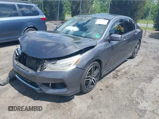 2017 Honda Accord Touring with VIN 1HGCR3F98HA015928, listed as a IAAI auction lot 42553437 with 168,902 mi miles and . Bid and sale history available at DreamBid. Image 17.