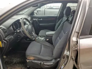 2012 Kia Sorento LX z VIN 5XYKT3A6XCG220216, wystawiony jako Copart lot #57467095 z przebiegiem 116 672 mil mil oraz Szkoda całkowita • Salvage title. Historia ofert i sprzedaży dostępna na DreamBid. Obrazek 7.