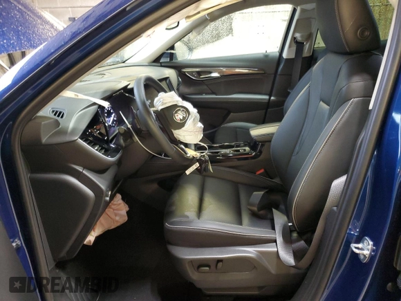 2023 Buick Envision Essence with VIN LRBFZPR42PD188553, listed as a Copart auction lot 49478065 with 9,879 mi miles and Salvage Title. Bid and sale history available at carsss.com. Image 7.