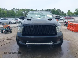 2012 Ram 1500 Sport z VIN 1C6RD7HT1CS300133, wystawiony jako IAAI lot #42248688 z przebiegiem 160 675 mil mil oraz . Historia ofert i sprzedaży dostępna na DreamBid. Obrazek 12.