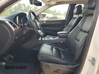 2012 Jeep Grand Cherokee Limited z VIN 1C4RJFBT0CC287342, wystawiony jako Copart lot #57000525 z przebiegiem 135 655 mil mil oraz Szkoda całkowita • Salvage title. Historia ofert i sprzedaży dostępna na DreamBid. Obrazek 7.