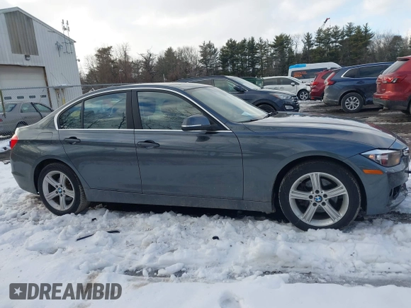 2015 BMW 3 Series 328i xDrive with VIN WBA3B5G55FNS14903, listed as a IAAI auction lot 41497975 with 62,009 mi miles. Bid and sale history available at carsss.com. Image 13.