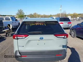 2023 Toyota RAV4 Hybrid XLE Premium with VIN JTMB6RFV3PD116696, listed as a IAAI auction lot 42044933 with 18,553 mi miles. Bid and sale history available at carsss.com. Image 16.