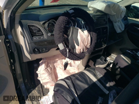 2014 Dodge Grand Caravan American Value with VIN 2C4RDGBG4ER163374, listed as a Copart auction lot 53212795 with Not Provided miles and Salvage Title. Bid and sale history available at DreamBid. Image 8.