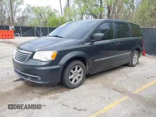 2012 Chrysler Town & Country Touring with VIN 2C4RC1BG3CR282465, listed as a IAAI auction lot 42001694 with 265,663 mi miles. Bid and sale history available at carsss.com. Image 2.