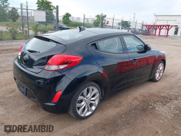 2012 Hyundai Veloster w/Gray Int with VIN KMHTC6AD6CU028810, listed as a IAAI auction lot 42818888 with 149,283 mi miles and . Bid and sale history available at DreamBid. Image 4.