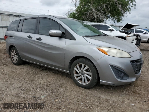 2015 Mazda 5 Sport z VIN JM1CW2BL2F0179147, wystawiony jako Copart lot #54125515 z przebiegiem 94 294 mil mil oraz Szkoda całkowita • Salvage title. Historia ofert i sprzedaży dostępna na DreamBid. Obrazek 4.