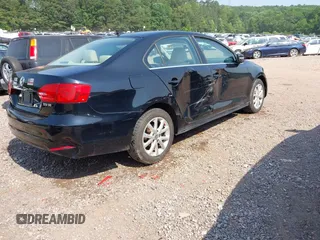 2013 Volkswagen Jetta SE with VIN 3VWDX7AJ8DM285270, listed as a IAAI auction lot 42328752 with 181,942 mi miles and . Bid and sale history available at DreamBid. Image 4.