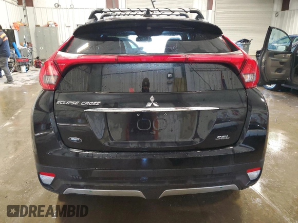 2020 Mitsubishi Eclipse Cross SE z VIN JA4AT5AA8LZ043012, wystawiony jako Copart lot #41849255 z przebiegiem 58 564 mil mil oraz Szkoda całkowita • Salvage title. Historia ofert i sprzedaży dostępna na DreamBid. Obrazek 6.