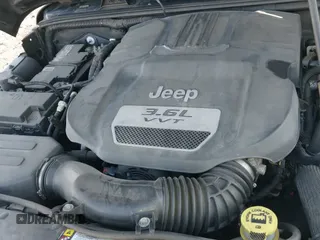 2012 Jeep Wrangler Sahara z VIN 1C4GJWBG4CL164203, wystawiony jako IAAI lot #41428441 z przebiegiem 94 776 mil mil oraz . Historia ofert i sprzedaży dostępna na DreamBid. Obrazek 19.