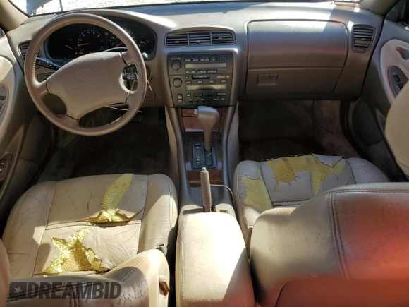 1996 Lexus ES 300 с VIN JT8BF12G4T0160599, выставлен на аукционе Copart как лот 87287404 с пробегом 132 013 миль миль и Списание • Salvage title. История ставок и продаж доступна на DreamBid. Изображение 8.