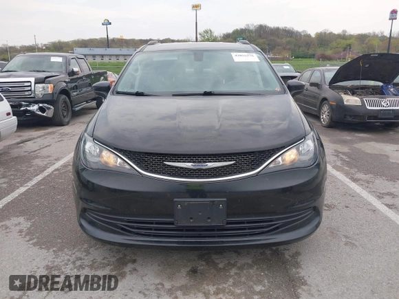 2020 Chrysler Voyager LXi z VIN 2C4RC1DG5LR164284, wystawiony jako IAAI lot #42055376 z przebiegiem 143 474 mil mil oraz . Historia ofert i sprzedaży dostępna na DreamBid. Obrazek 12.