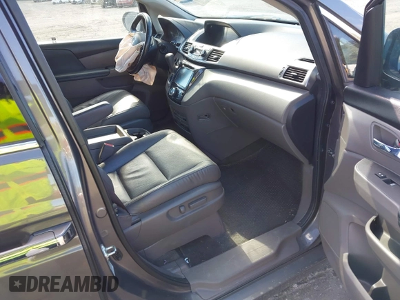2016 Honda Odyssey Touring Elite with VIN 5FNRL5H90GB128006, listed as a IAAI auction lot 41695438 with 133,337 mi miles. Bid and sale history available at carsss.com. Image 5.
