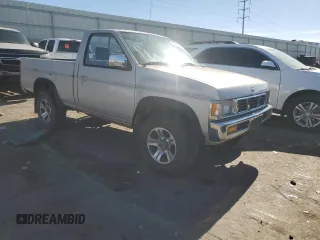 1996 Nissan Frontier XE z VIN 1N6SD11Y5TC327761, wystawiony jako Copart lot #79662594 z przebiegiem 151 631 mil mil oraz Szkoda całkowita • Salvage title. Historia ofert i sprzedaży dostępna na DreamBid. Obrazek 4.
