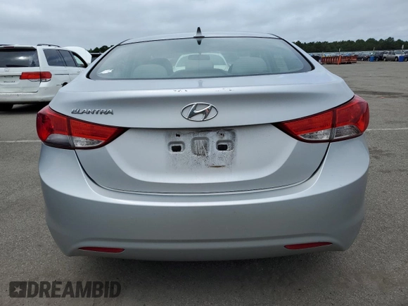2013 Hyundai Elantra GLS z VIN 5NPDH4AE9DH382677, wystawiony jako Copart lot #64910834 z przebiegiem 209 074 mil mil oraz Nie do naprawy. Historia ofert i sprzedaży dostępna na DreamBid. Obrazek 6.