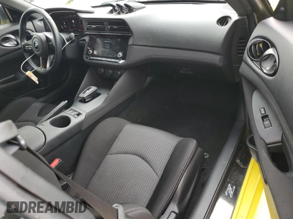 2023 Nissan Z Sport с VIN JN1BZ4AH0PM310987, выставлен на аукционе Copart как лот 74926264 с пробегом 10 474 миль миль и Списание • Salvage title. История ставок и продаж доступна на DreamBid. Изображение 8.